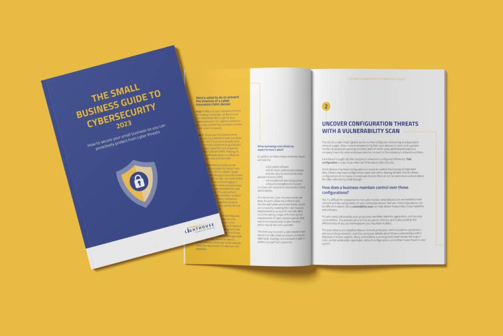 yellow background with a digital mockup of the printed cybersecurity booklet. It has a blue cover with yellow and white designs on the pages inside.